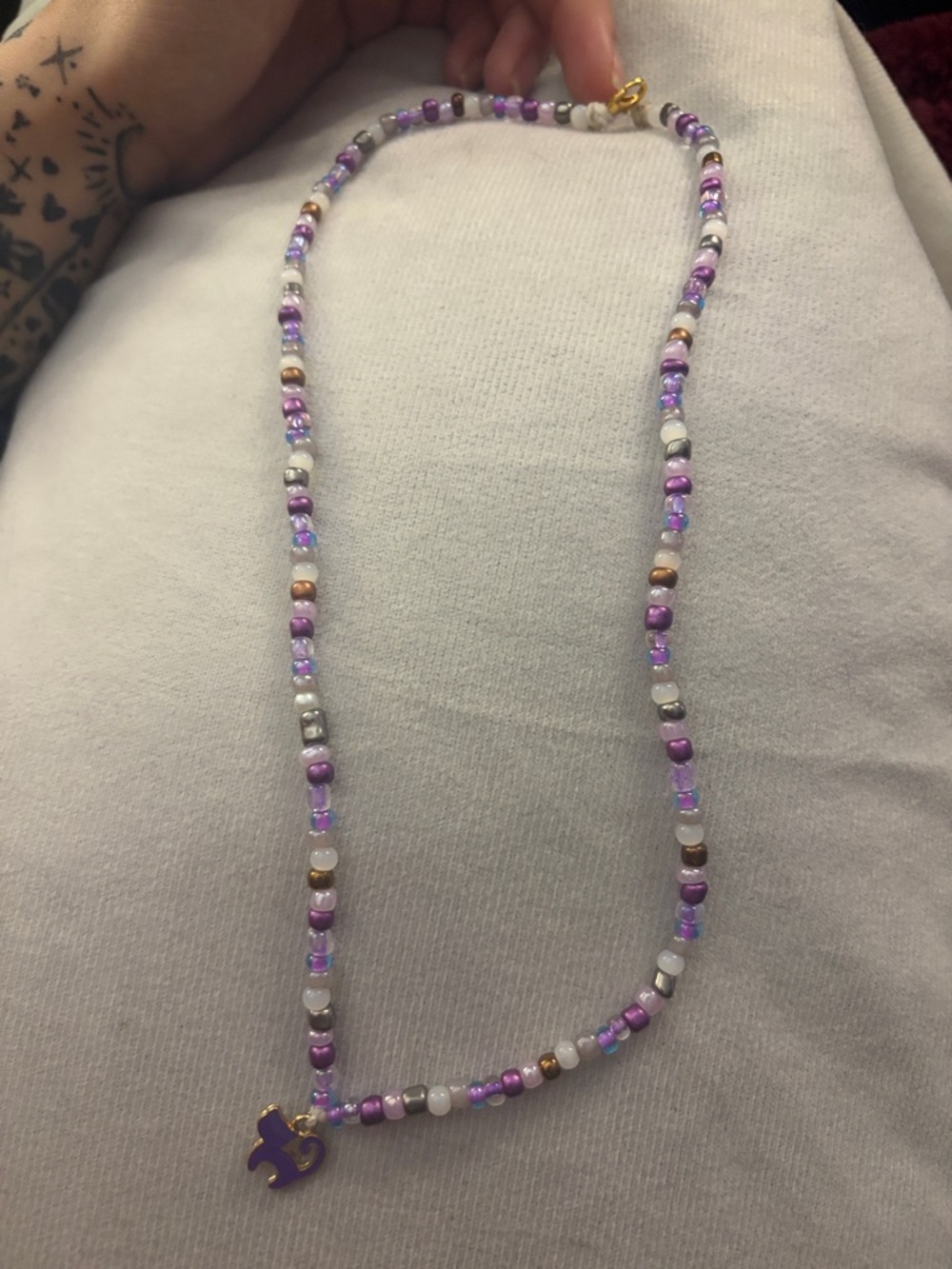 Handcrafted Purple Cat Beaded Necklace with Gold Accent Charm